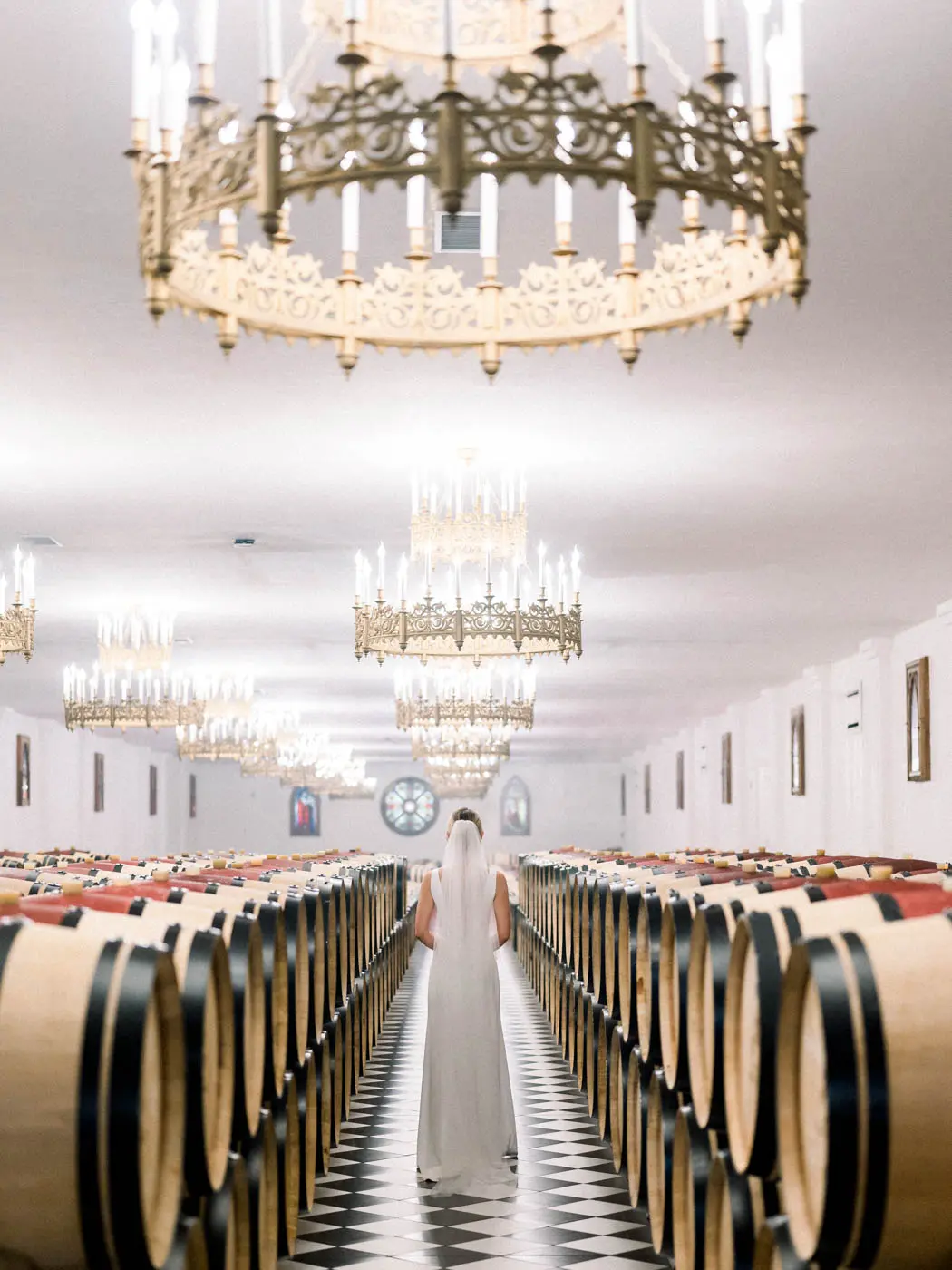 Bride in the barrel cellar of Château Pape Clément