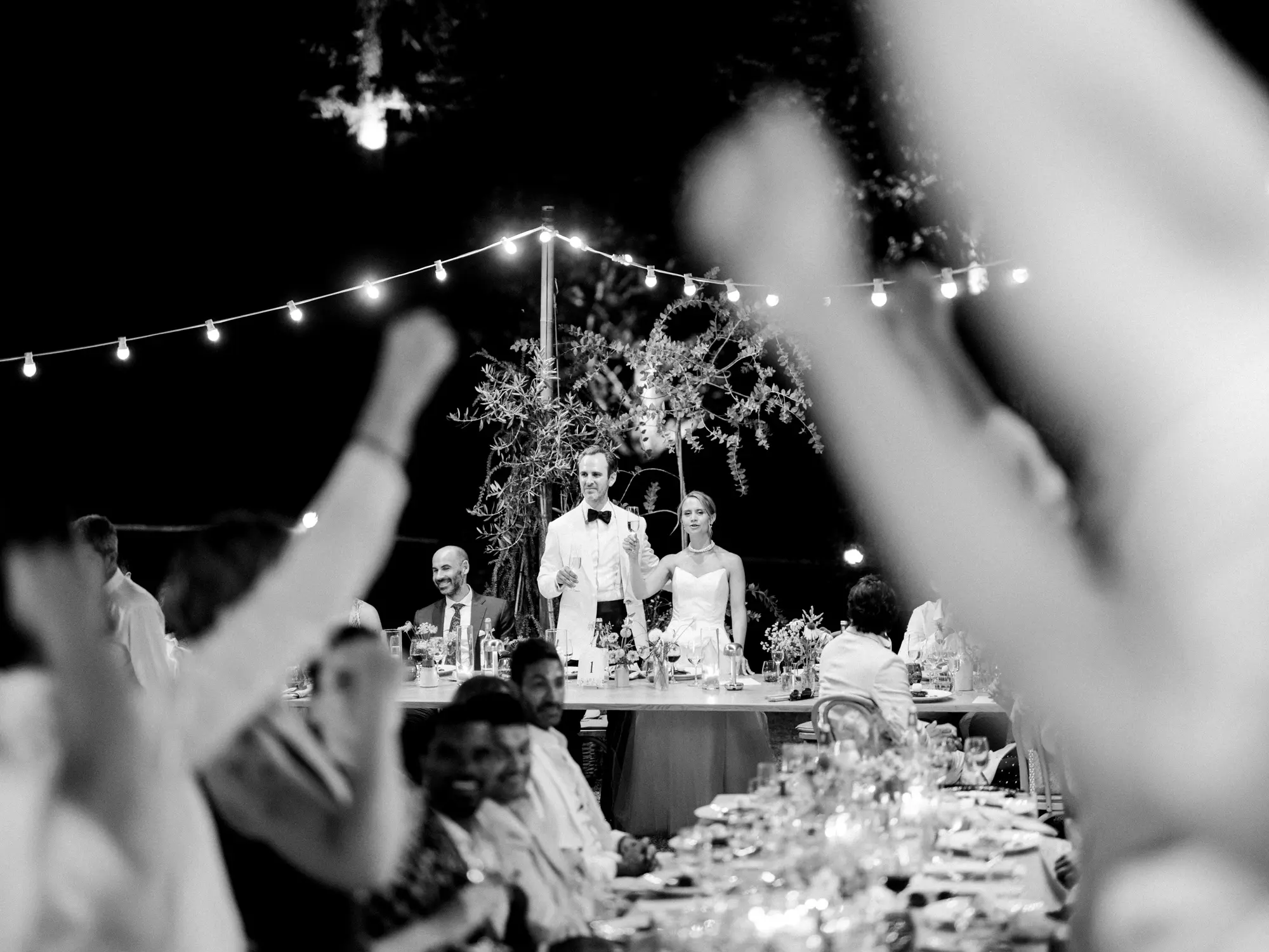 Bride and groom during the dinner of their wedding at Domaine de la Fauconnie, France.