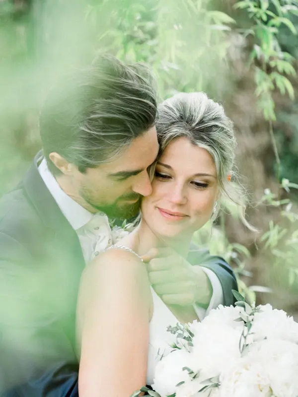 Groom holding the bride close at Villa La Tosca
